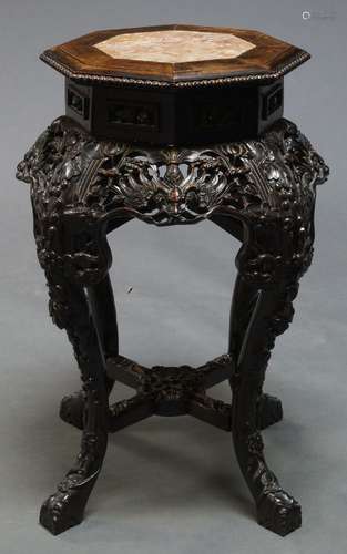 A Chinese carved hardwood jardiniere stand, mid-19th century, with octagonal rouge marble inset top,