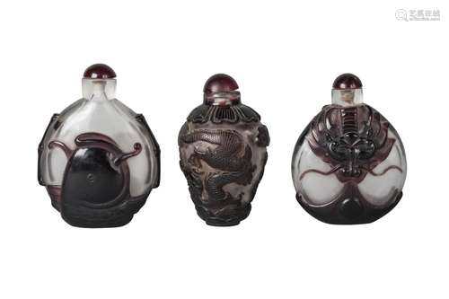 Three Chinese Peking glass cameo large snuff bottles, early 20th century, two of flattened, ovoid