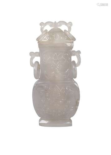 A Chinese agate vase and cover, early 20th century, in the archaic style, the cover and neck with