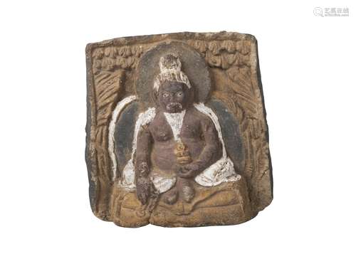 A Tibetan painted terracotta votive figure, 18th/19th century, depicting Lama seated, 13cm x 11cm