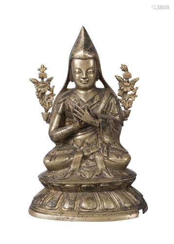 A Sino-Tibetan bronze figure of Tsongkhapa, 19th century, seated in Dhayasana, with detachable