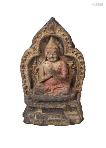 A Tibetan painted terracotta votive figure, 18th/19th century, depicting Tsongkhapa, 15cm high