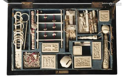 A Chinese Canton ivory puzzle compendium, mid-19th century, comprising various carved ivory