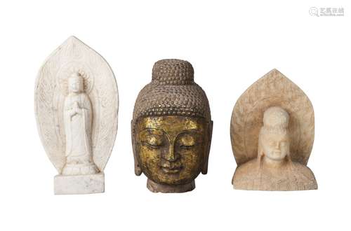 Three Chinese/South East Asian stone carvings, 20th century, comprising a gilded head of Buddha,