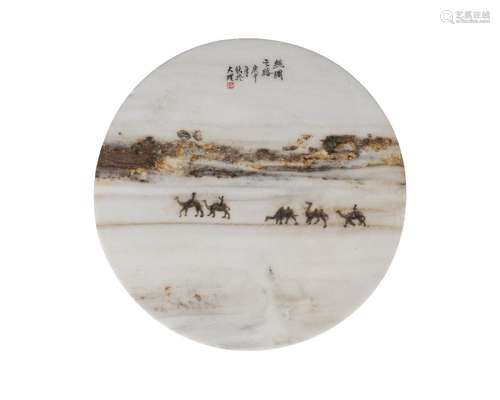 A Chinese 'dream' marble circular plaque, early 20th century, carved to one side in low relief