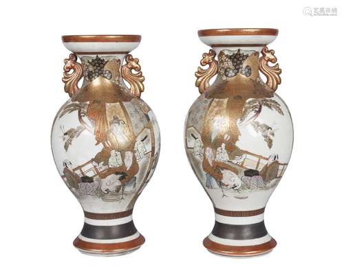 A pair of Japanese kutani porcelain baluster vases, early 20th century, the bodies painted with a