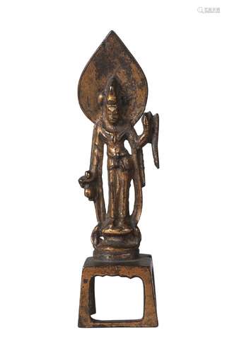 A Chinese bronze miniature figure of Guanyin, Tang dynasty, 8th century, with left hand raised