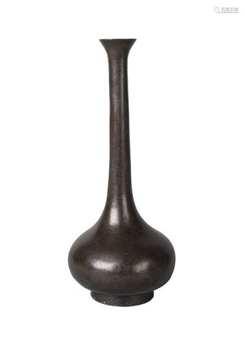 A Chinese bronze and silver inlaid stick-neck vase, 17th century, with compressed body and elongated