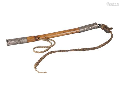 A Tibetan whip, 19th century, with engraved white metal mounts to wood handle, length of shaft, 34cm