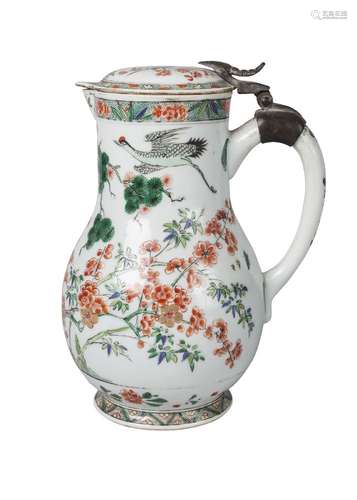 A Chinese porcelain jug and cover, 18th century, painted in famille verte enamels with red-crested