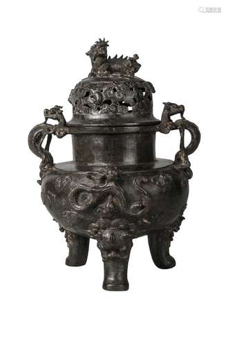 A large Chinese bronze tripod censer and cover, Ming dynasty, 16th century, the body cast with a