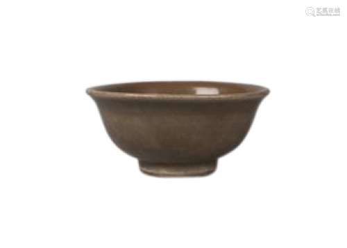 A Chinese Longquan celadon bowl, Yuan dynasty, 14th century, with thick celadon glaze over grey