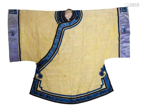 A Chinese yellow kesi silk floral jacket, early 20th century, with blue silk embroidered floral