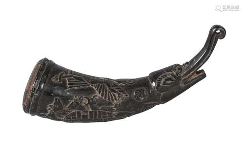 A Tibetan polished horn shaman's finial, 19th century, carved to one side with Garuda and