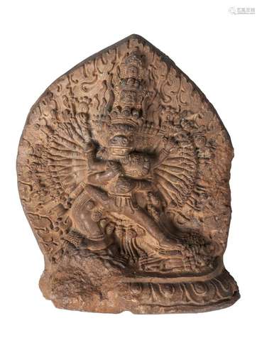 A Tibetan terracotta votive plaque of Yamantaka, 18th century, with consort, and flaming mandala,