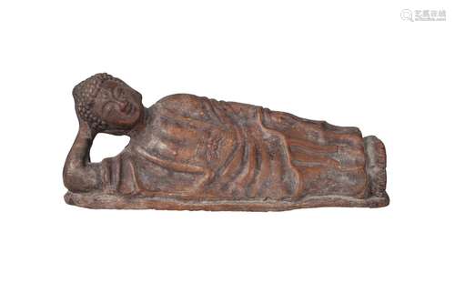 A Chinese terracotta figure of Shakyamuni Buddha, 19th century, modelled reclining with head