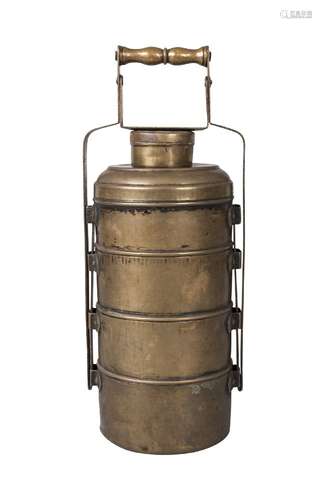 A Tibetan brass travelling food container, 19th century, of cylindrical form, with five stacking