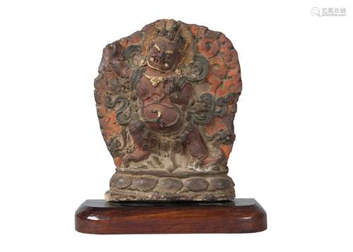 A Tibetan painted terracotta votive plaque, 17th century, depicting Havagriva, 20cm high