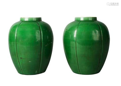 A pair of Chinese monochrome porcelain apple-green glazed lobed jars, Kangxi period, early 18th