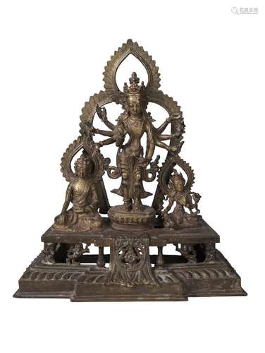 A Nepalese bronze figure group, 19th century, centred with Avalokitesvara flanked by Buddha and