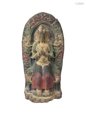 A Tibetan painted terracotta votive plaque, 17th/18th century, depicting Green Tara seated, 15cm