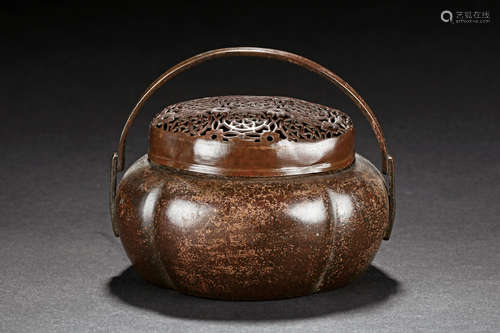 ZHANG MINGQI: BRONZE HAND WARMER WITH HANDLE