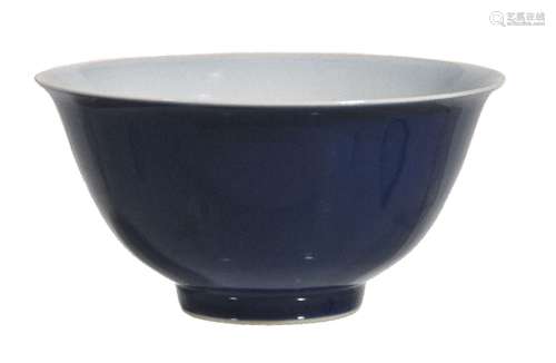 A Chinese blue-glazed bowl, finely potted with deep rounded sides rising from a small, slightly