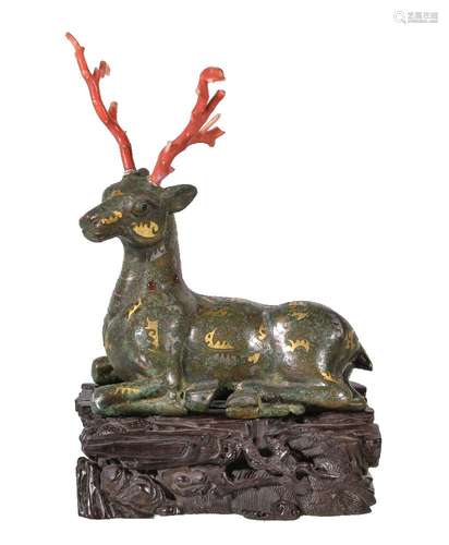 Y A Chinese bronze Warring States style stag, inlaid with scroll motifs coloured in gold and silver,