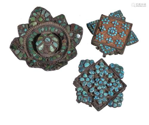 A Tibetan silver turquoise inlaid belt ornament, probably 18th century, in the form of a concave