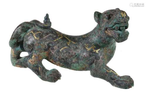 A Chinese archaistic model of a mythical tiger, the vigorously modelled striding beast with mouth