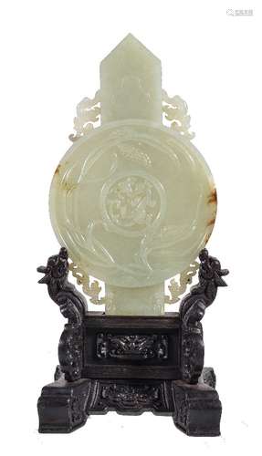 A Chinese Archaistic celadon and russet jade plaque, carved in the form of a gui sceptre