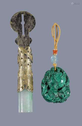 A Chinese malachite 'fruit' pendant, Qing Dynasty, carved with ripe fruit and foliage, 4.5cm high