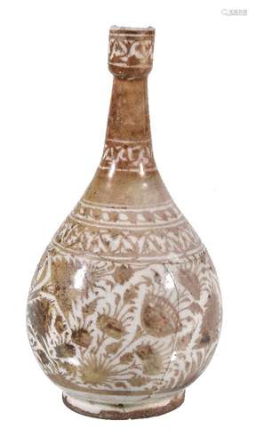 A Safavid copper lustre vase, Persia, 17th century, of baluster form, the sides profusely