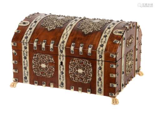 Y An Anglo Indian sandalwood and ivory mounted dome topped coffer, mid 19th century,