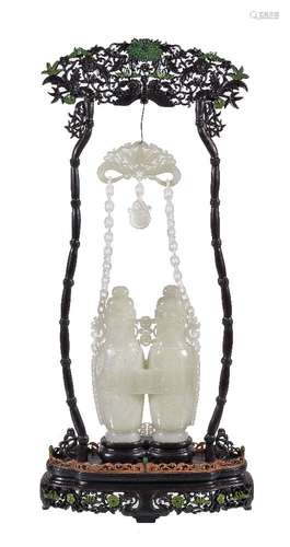 A Chinese pale celadon jade 'hanging' double vase and covers, 20th century, the double 'coupled'