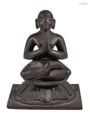 A bronze figure of a Tamil saint, probably Appar, Southern India, 19th century, seated in sattvasana