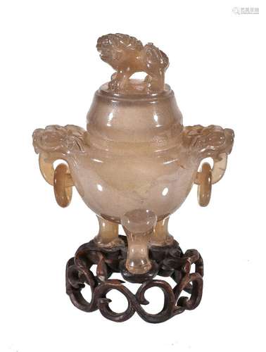 A Chinese archaistic carved agate censer and cover, the compressed globular body rising from three