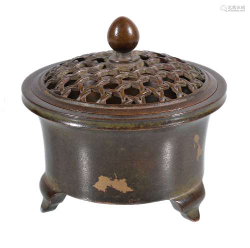 A small Chinese 'gold splash' tripod censer, of circular form, with pierced 'basketweave' cover,
