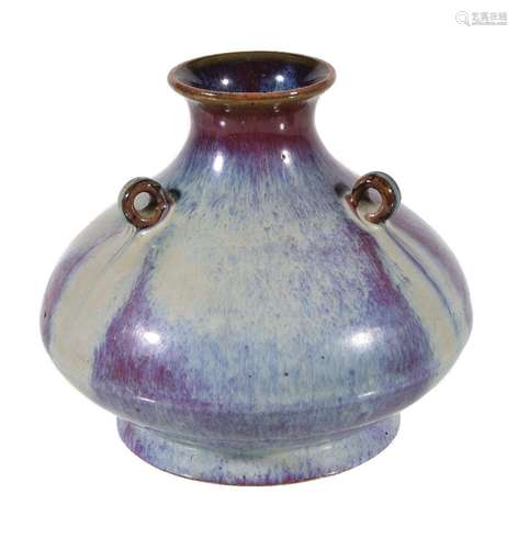 A Chinese flambé glazed vase, with a globular body, flared neck and lug handles, with apocryphal