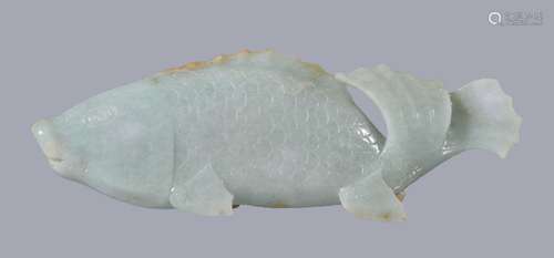 A Chinese jadeite celadon carving of a fish, late Qing Dynasty or Republican, probably a carp,