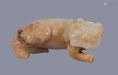 A Chinese white and brown jade carving of a 'Mythical Beast', Qing Dynasty, 18th -19th century,