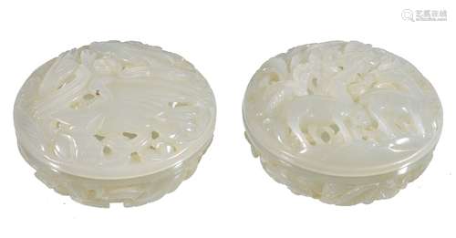 A pair of Chinese pale celadon pierced 'goose and lotus' circular boxes and covers, 5.2cm