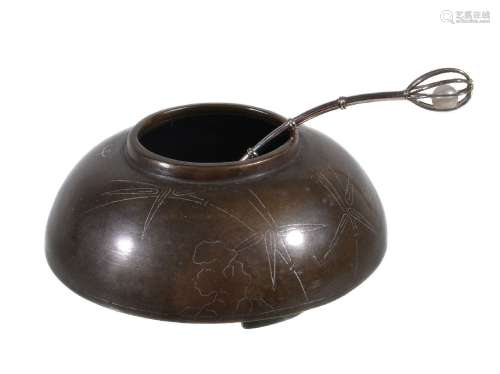 A Chinese bronze silver-inlaid water pot, Qing Dynasty, of squat ovoid form, with lipped-mouth,