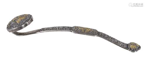 An unusual Chinese silver-gilt inlaid ruyi sceptre, of hollow form, with repousse work of phoenix