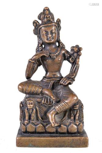 A bronze figure of Padmapani, in Kashmir style, seated on a lion throne with legs loosely crossed