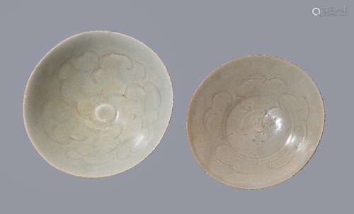 Two Chinese Qingbai bowls, Southern Song Dynasty, variously decorated to the interiors with