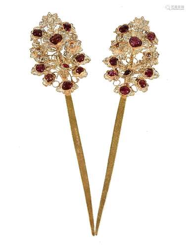 A pair of Chinese white metal and ruby hair ornaments, each with filigree 'flower and bird'