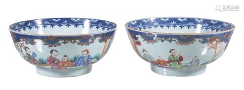 A pair of Chinese Famille Rose bowls, Qianlong, each painted to the exterior with two large panels