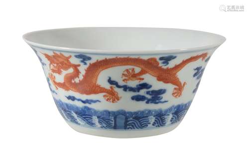 A Chinese blue and white and iron-red 'dragon' bowl, with rounded sides rising to an everted rim,