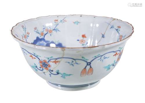 A Japanese Arita bowl, the deep bowl decorated in iron-red, turquoise and underglaze blue, the lobed